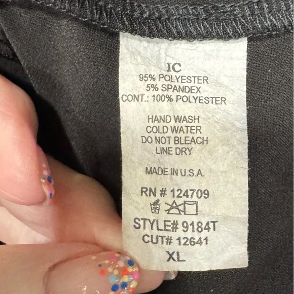 Chic Black 3/4 Sleeve Tunic with Asymmetrical Cutouts - Picture 4 of 5